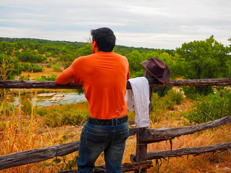 Back of the LESPIRANT LCut undershirt at a ranch in Texas